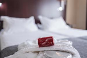 Postel nebo postele na pokoji v ubytování Hotel Salymar