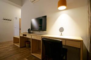 TV a/nebo společenská místnost v ubytování Free wind B&B