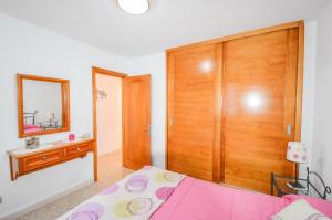 Postel nebo postele na pokoji v ubytování Apartment 3 minutes from Puerto Rico beach