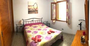 Postel nebo postele na pokoji v ubytování Apartment 3 minutes from Puerto Rico beach
