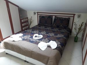 Postel nebo postele na pokoji v ubytování Hotel NilSu