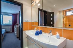 A bathroom at Classy Apartment - Telgárt Resort