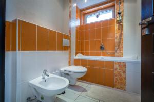 A bathroom at Classy Apartment - Telgárt Resort