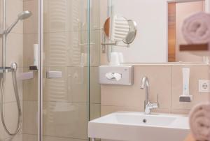Kúpeľňa v ubytovaní Hotel Bacher Asitzstubn