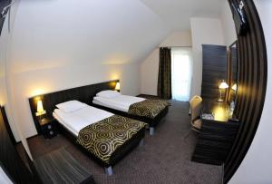 Postel nebo postele na pokoji v ubytování Hotel Sulbin + 37 fotografií