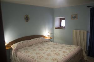 Postel nebo postele na pokoji v ubytování Anticarua B&B