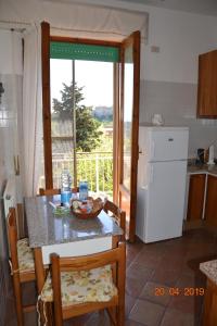 A kitchen or kitchenette at Casa Isabella