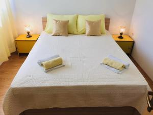 Ένα ή περισσότερα κρεβάτια σε δωμάτιο στο Apartman Star
