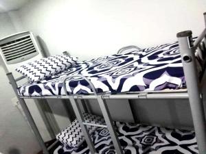 Postel nebo postele na pokoji v ubytování Mang Ben Dormitory