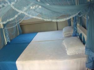 Voodi või voodid majutusasutuse Zimmer Rest toas