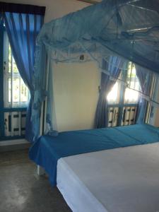 Voodi või voodid majutusasutuse Zimmer Rest toas