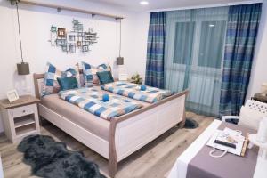 Posteľ alebo postele v izbe v ubytovaní Pension & Restaurant La Amalia