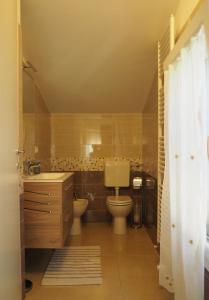 Kylpyhuone majoituspaikassa Borgo Tarapino