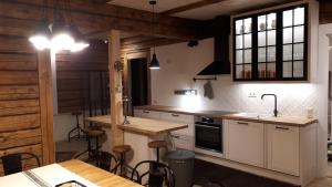 A kitchen or kitchenette at Sportsmen´s Holiday House