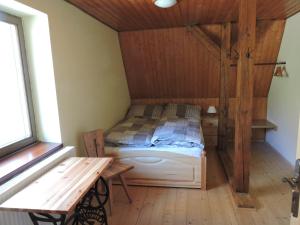Postelja oz. postelje v sobi nastanitve Apartmány Na Lontě