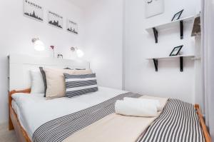 Lova arba lovos apgyvendinimo įstaigoje Apartments Dexter Warsaw by Renters