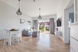 Posedenie v ubytovaní Apartamenty Sun & Snow Seaside Grzybowo