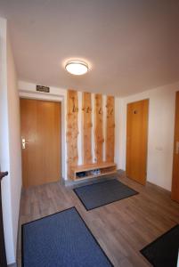 A bed or beds in a room at Ferienhaus "Schneider"