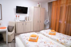 Posteľ alebo postele v izbe v ubytovaní Pension & Restaurant La Amalia