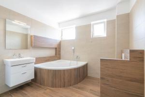 Kúpeľňa v ubytovaní Apartmány Noviny