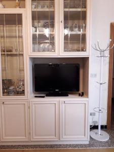 A television and/or entertainment centre at Riva Beach House