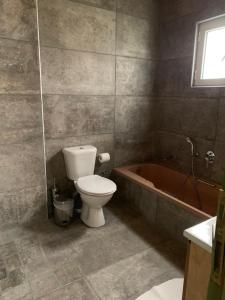 A bathroom at Anastasios Olive Garden Apartments