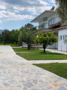 A garden outside Anastasios Olive Garden Apartments