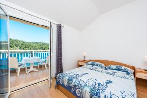 מיטה או מיטות בחדר ב-Apartments Radulj