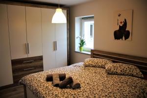 Postel nebo postele na pokoji v ubytování Apartmaji Hrvatin v Kortah