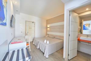 Postel nebo postele na pokoji v ubytování MLL Palma Bay Club Resort