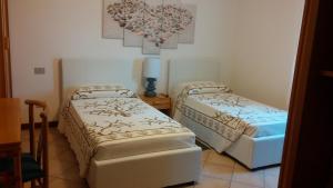 Postel nebo postele na pokoji v ubytování B&B Benjamin