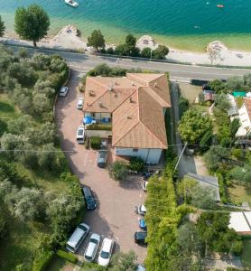 an aerial view of a house with a roof at B&B Hotel Delle Rose in Torri del Benaco