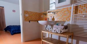 a bathroom with a sink and a sink at B&B Sotto le Stelle in Fano