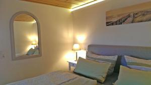 Säng eller sängar i ett rum på Ferienhaus Dranske RUeG 341