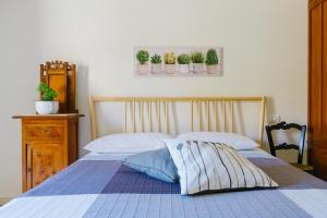 Letto o letti in una camera di Ciatu Miu