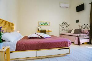Letto o letti in una camera di Ciatu Miu