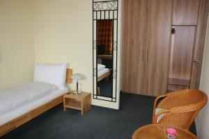 Postel nebo postele na pokoji v ubytování Hotel & Bildungszentrum Matt