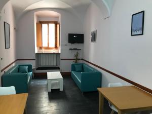 Televízia a/alebo spoločenská miestnosť v ubytovaní Albergue las Veletas
