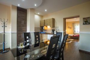 Posedenie v ubytovaní Nyirfa Apartmanház