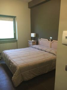 Voodi või voodid majutusasutuse Hotel Ristorante Borgo Antico toas