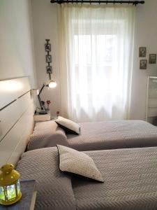 Кровать или кровати в номере Appartamento Orvieto A casa di Giulio