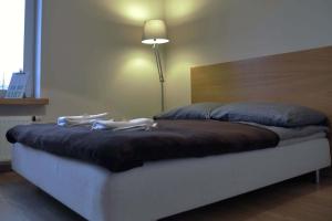 Ein Bett oder Betten in einem Zimmer der Unterkunft Perła Bałtyku - 4 osobowy Apartament w Sopocie