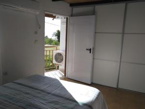Katil atau katil-katil dalam bilik di Apartamento El Almendrero