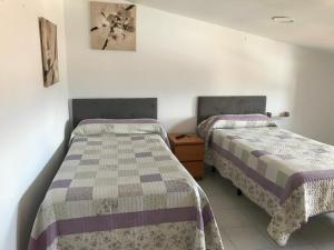 Posteľ alebo postele v izbe v ubytovaní Albergue las Veletas