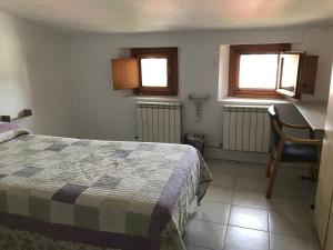 Posteľ alebo postele v izbe v ubytovaní Albergue las Veletas