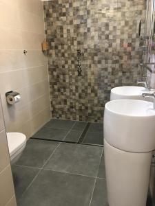 Koupelna v ubytování B&B De Donk