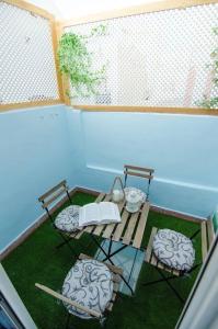 Balkón nebo terasa v ubytování La casita azul de la playa
