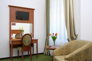 TV a/nebo společenská místnost v ubytování Hotel Palace