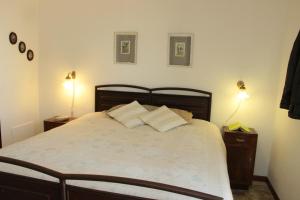 A bed or beds in a room at Agriturismo Ponterosa