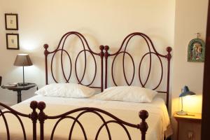 A bed or beds in a room at Agriturismo Ponterosa